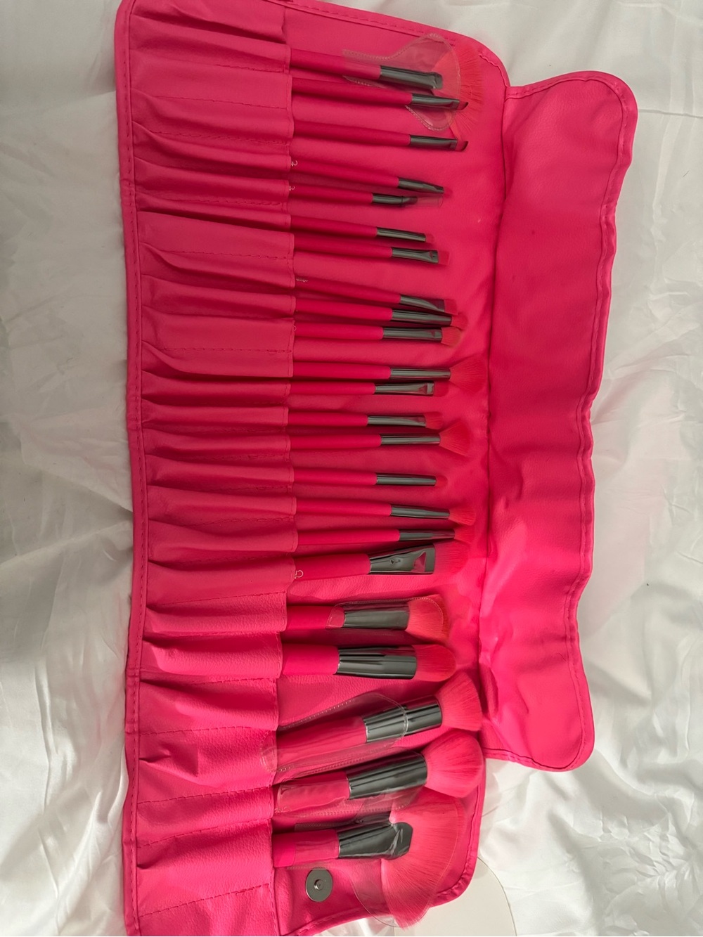 Hot pink Beauty creations makeup brushes